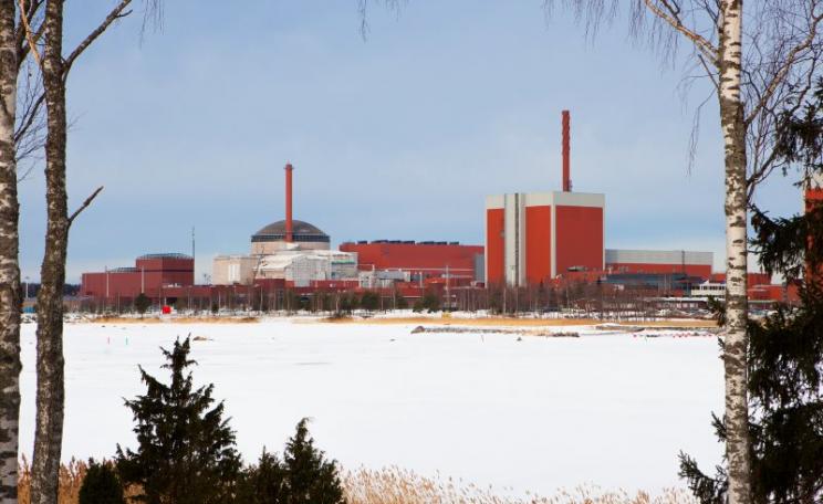 The Olkiluoto nuclear power complex in the snow, with the Unit 3 EPR under construction to the left. A second EPR has now been cancelled. Photo: Mattias Olsson via Flickr (CC BY-NC-SA).